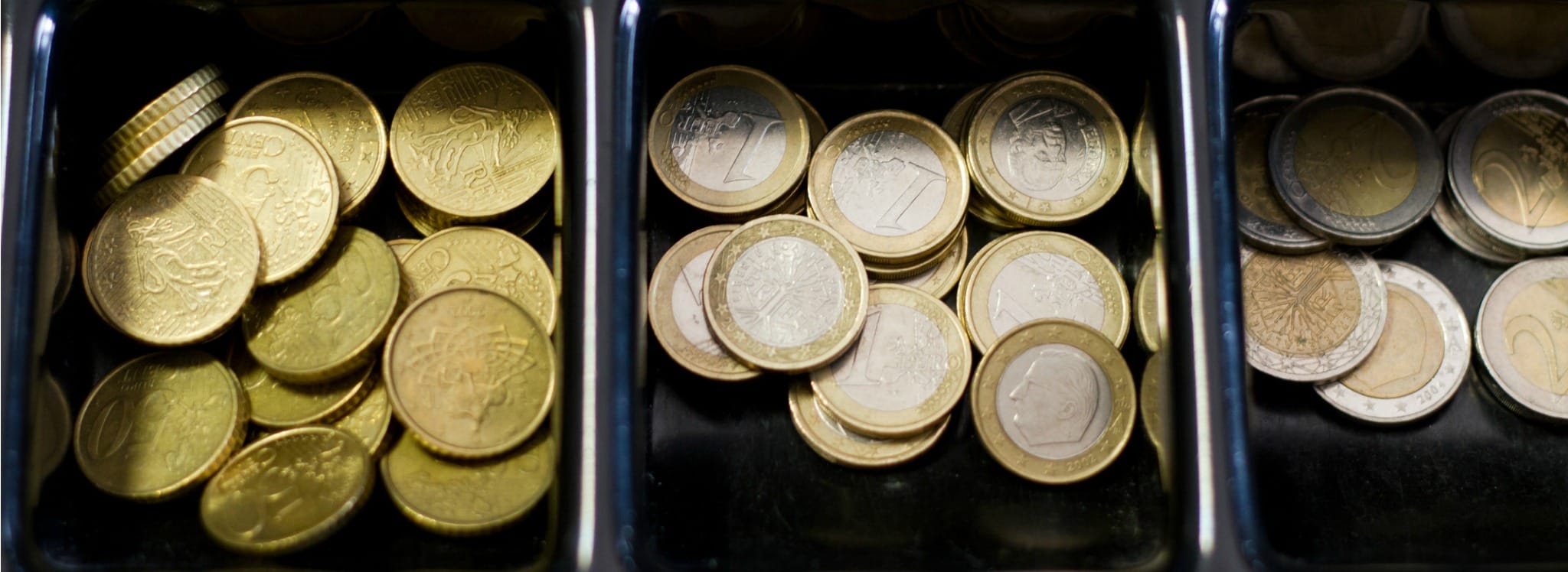 petite monnaie dans un tiroir de caisse Tactill
